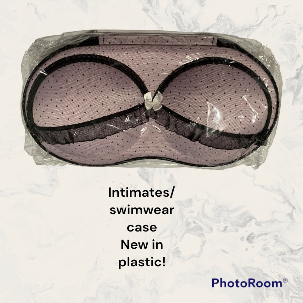 New in plastic bra/swimsuit holder hard plastic inside.  Wet or dry items OS
